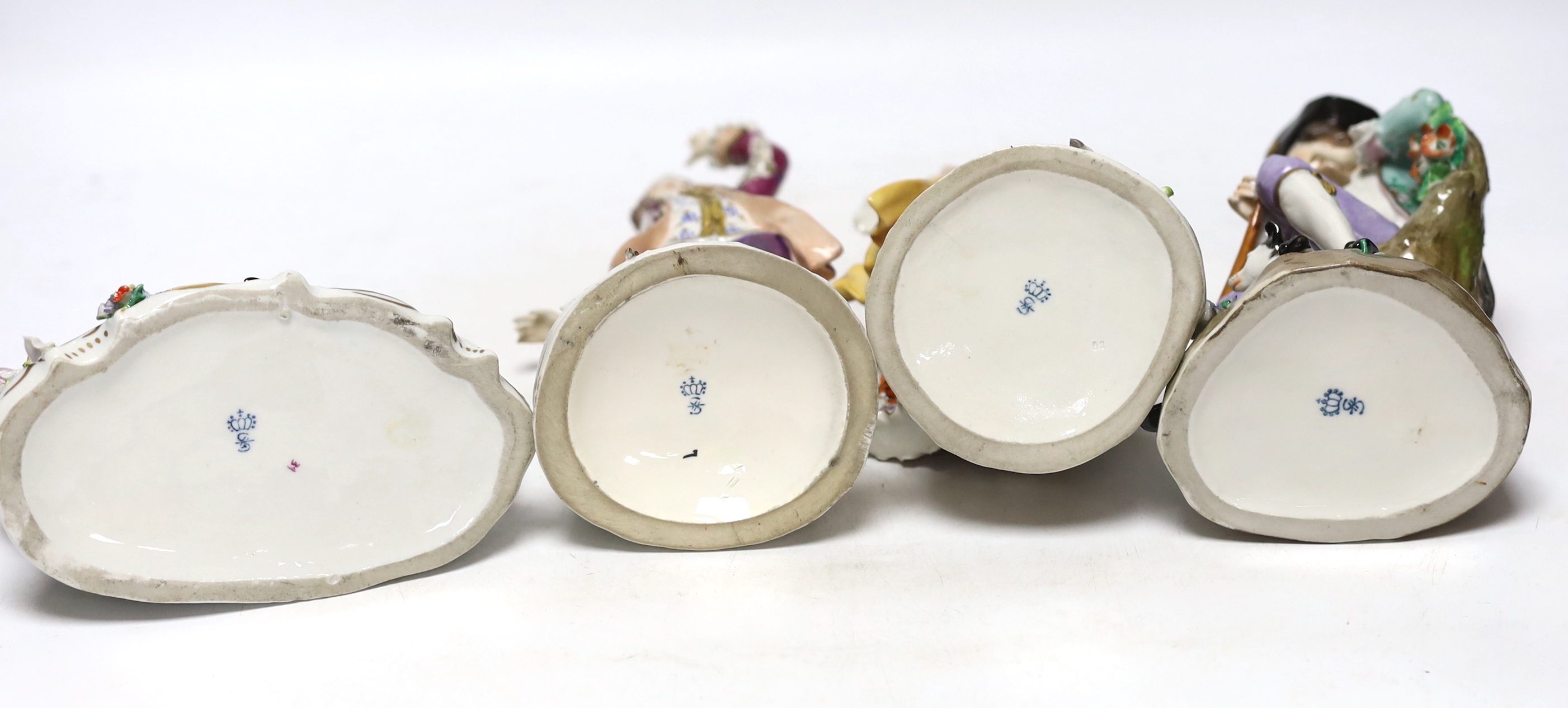 Four Sitzendorf porcelain figures in groups, early 20th century, 26cm